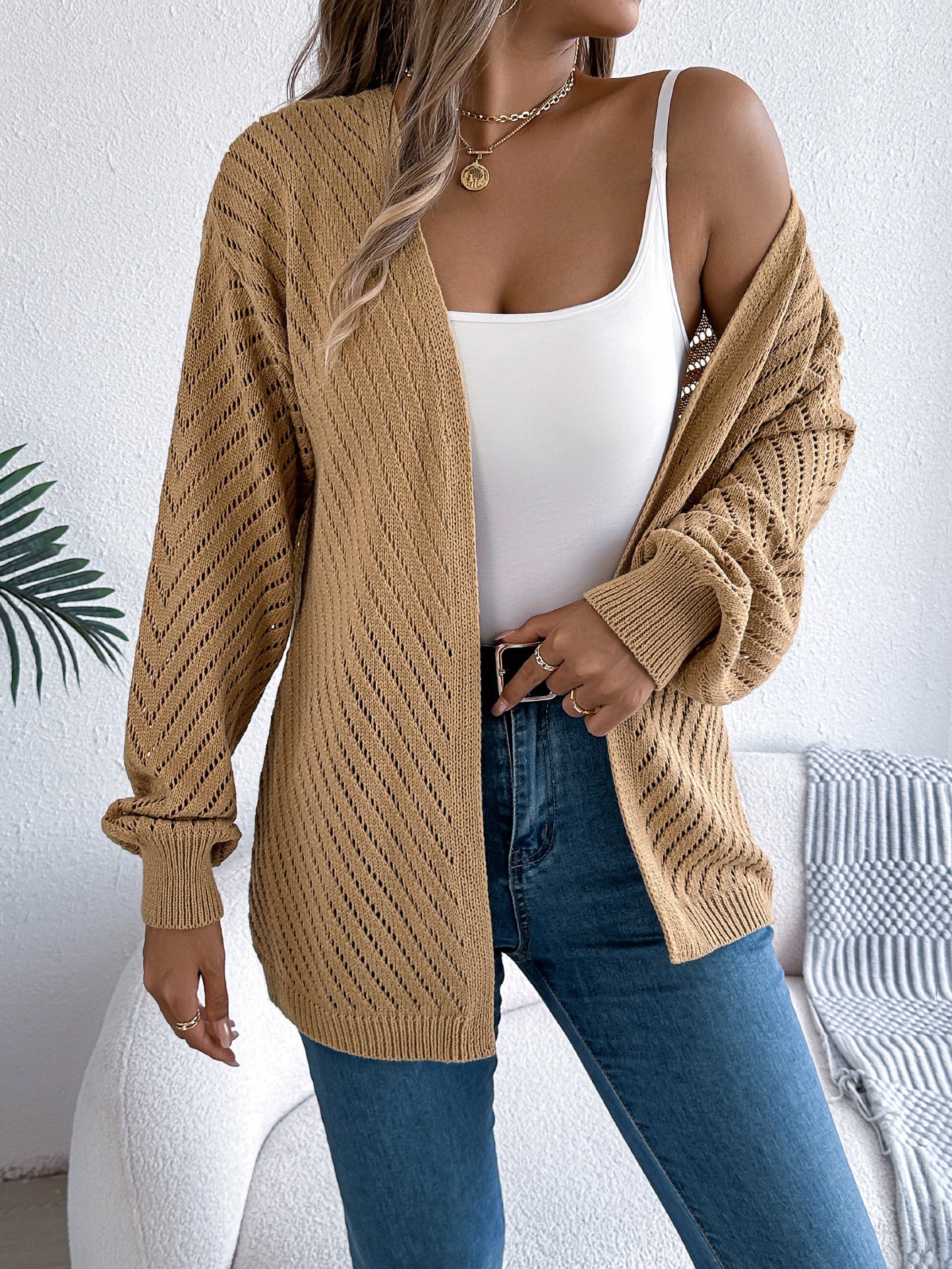 Casual solid color hollow out long sleeved cardigan sweater jacket